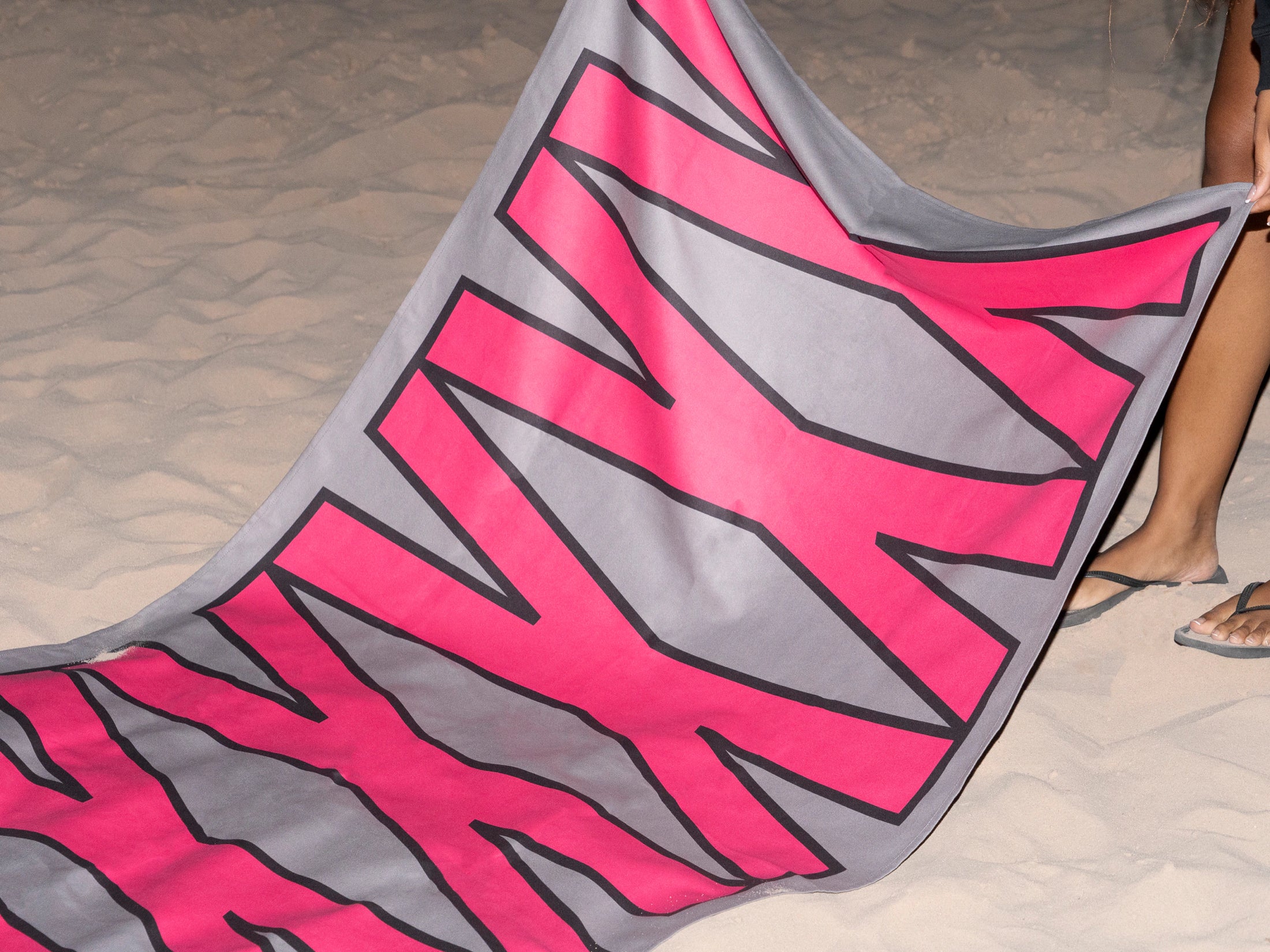 3SQM XL microfiber beach towel editorial photograph